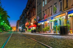 Shops Along Cobblestone Street in Savannah, GA at Twilight